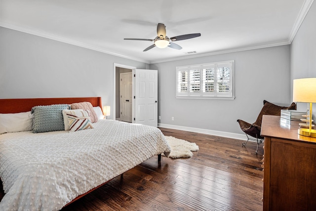 bedroom featuring dark hardwood / wood-style flooring, ornamental molding, and ceiling fan