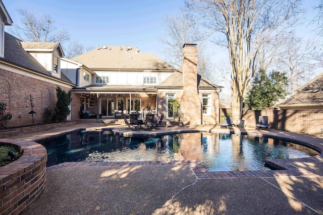 view of pool with a patio