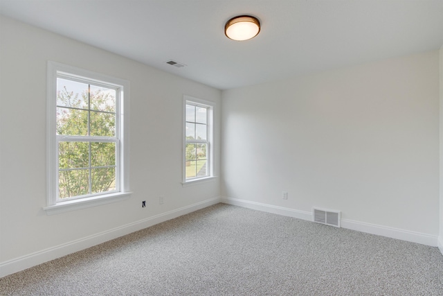 view of carpeted spare room