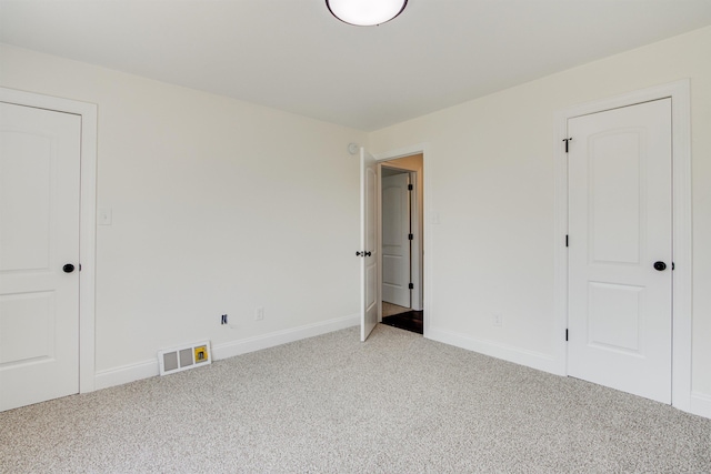 unfurnished bedroom featuring carpet floors