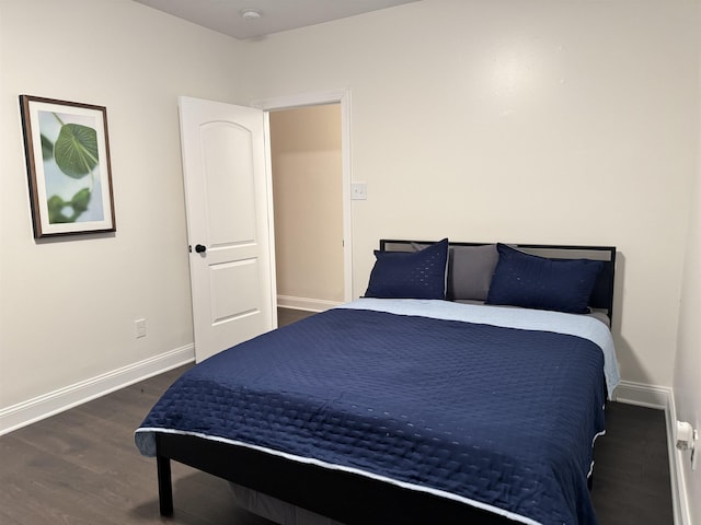 bedroom featuring dark hardwood / wood-style floors