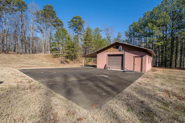 garage with a lawn