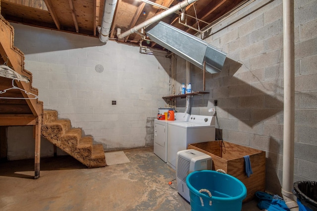 basement featuring washing machine and dryer