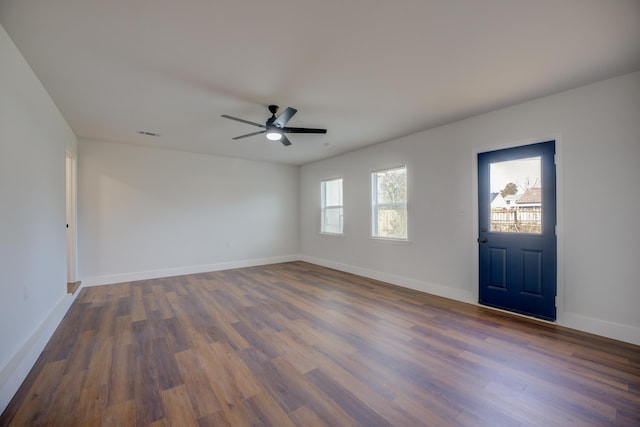 foyer entrance featuring dark hardwood / wood-style flooring and ceiling fan