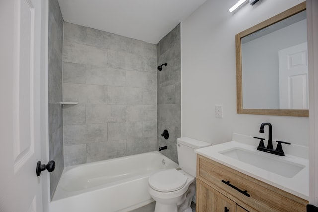 full bathroom with vanity, toilet, and tiled shower / bath