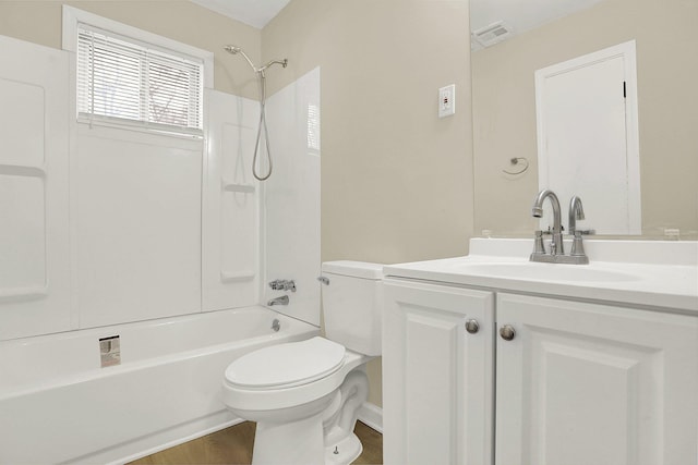 full bathroom with washtub / shower combination, vanity, toilet, and hardwood / wood-style floors