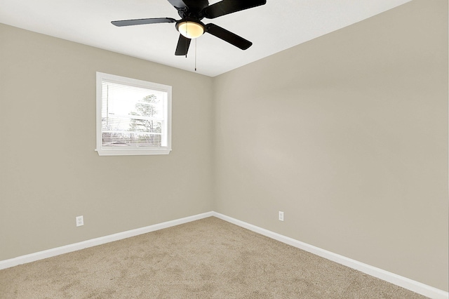 unfurnished room with carpet floors and ceiling fan