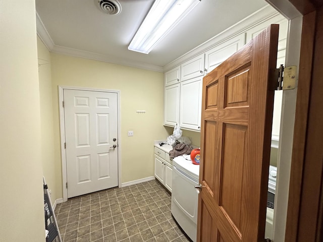 washroom featuring cabinets, ornamental molding, and washer / clothes dryer