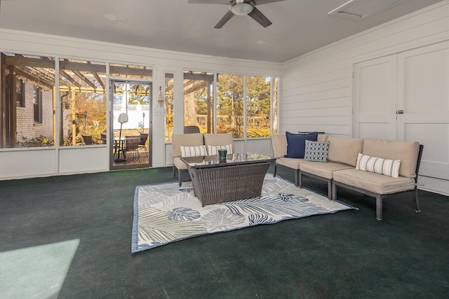 sunroom / solarium with ceiling fan