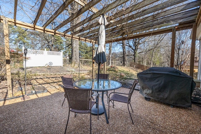 view of patio / terrace featuring area for grilling and a pergola