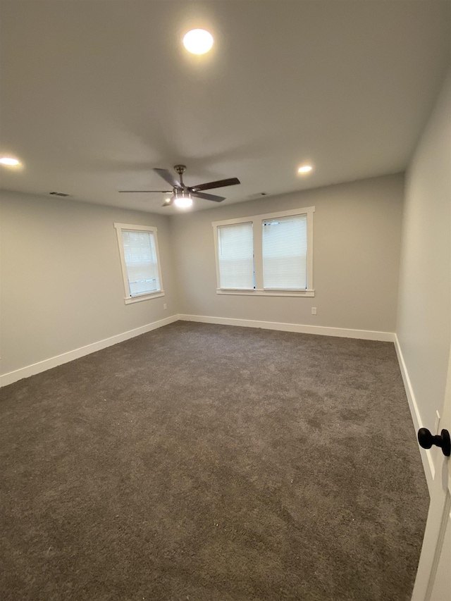 carpeted empty room with ceiling fan