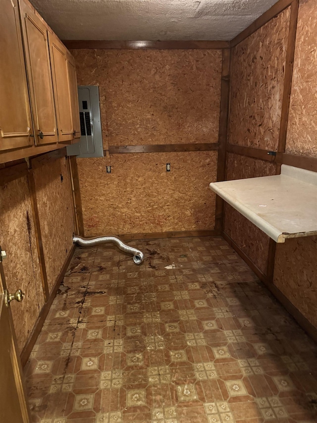 584 Shofner Ave, Memphis, TN 38109 - laundry area with electric panel and tile patterned floors