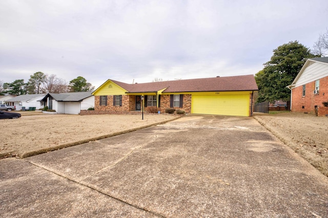 single story home with a garage