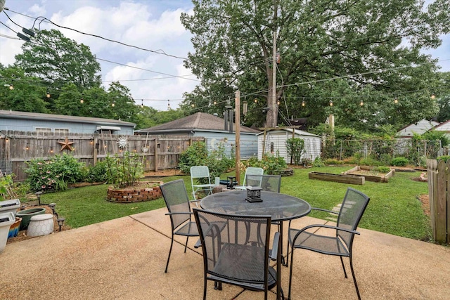 view of patio with a storage shed