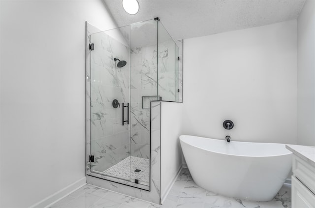 bathroom featuring vanity, shower with separate bathtub, and a textured ceiling