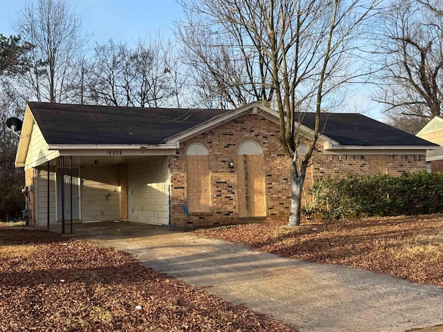 exterior space featuring a carport and a garage