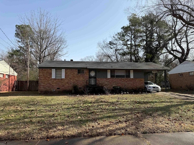 single story home featuring a front yard and a carport