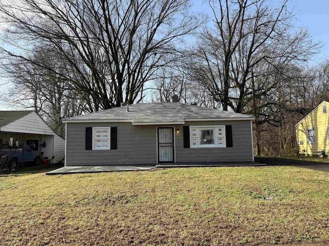 ranch-style house with a front lawn