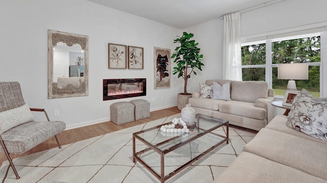 living room with light hardwood / wood-style flooring