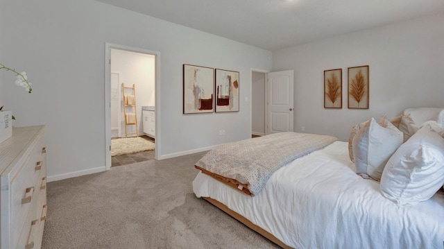 carpeted bedroom with connected bathroom