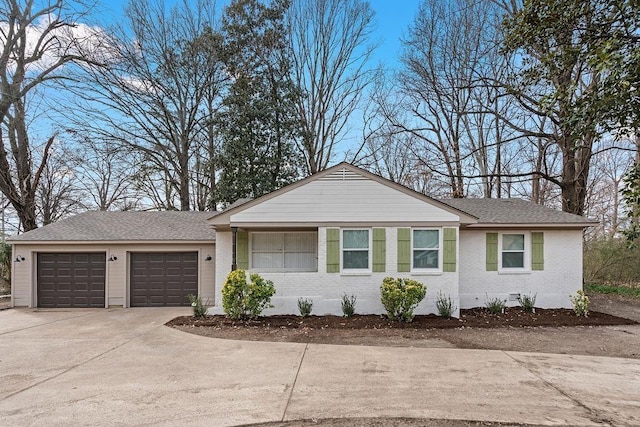 ranch-style home with a garage