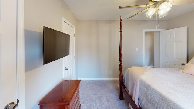 bedroom with ceiling fan and carpet flooring