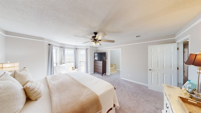 carpeted bedroom with ceiling fan and a textured ceiling