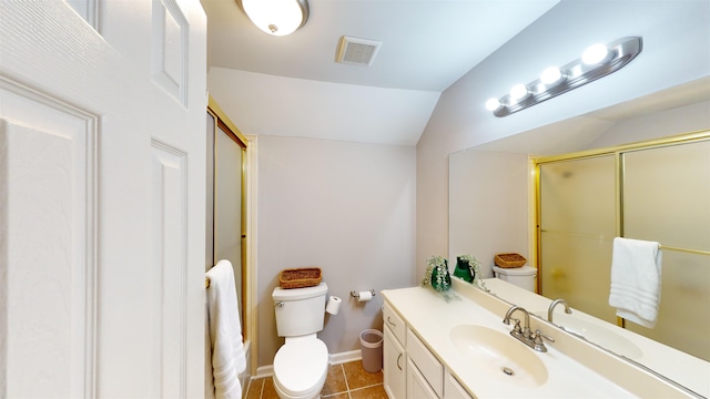 bathroom featuring vaulted ceiling, tile patterned floors, a shower with door, and vanity