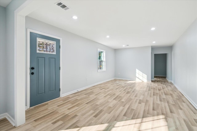 foyer with light wood-type flooring