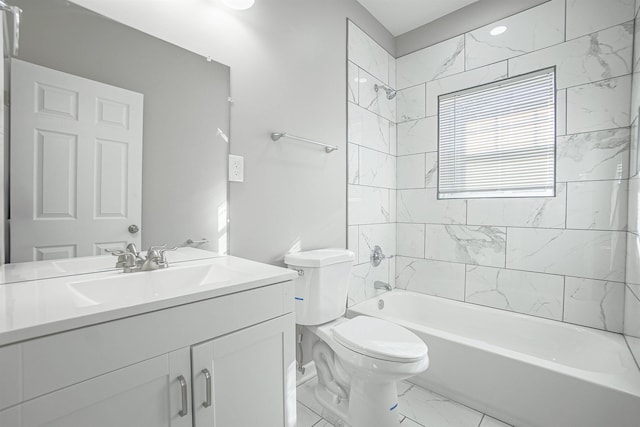 full bathroom with vanity, tiled shower / bath combo, and toilet