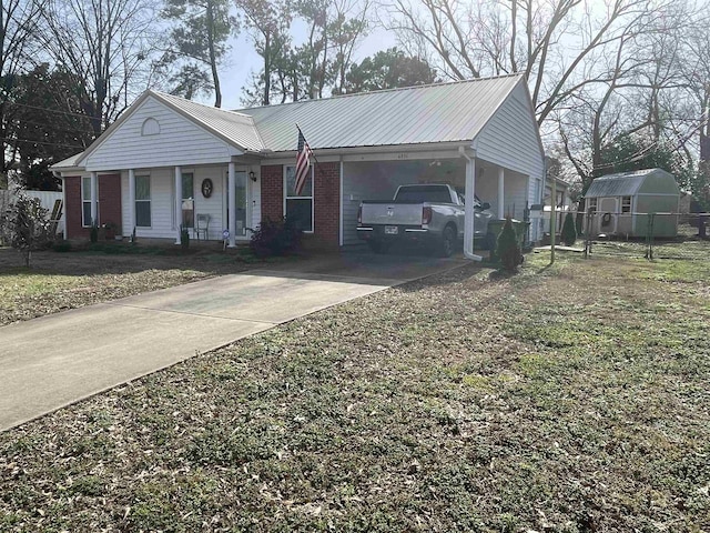 ranch-style house featuring a carport and a porch