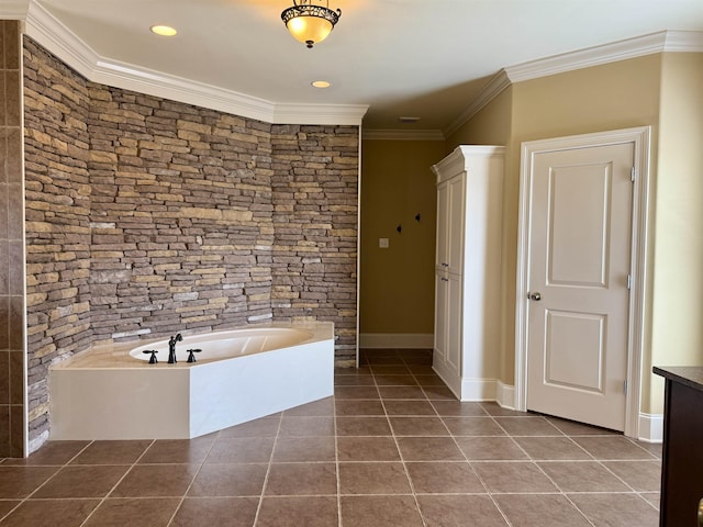 bathroom featuring crown molding, tile patterned floors, and a bathtub