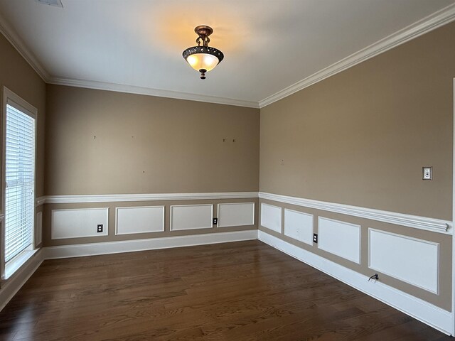 unfurnished room with crown molding and dark hardwood / wood-style flooring