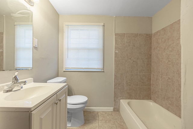 bathroom with tile patterned flooring, vanity, and toilet