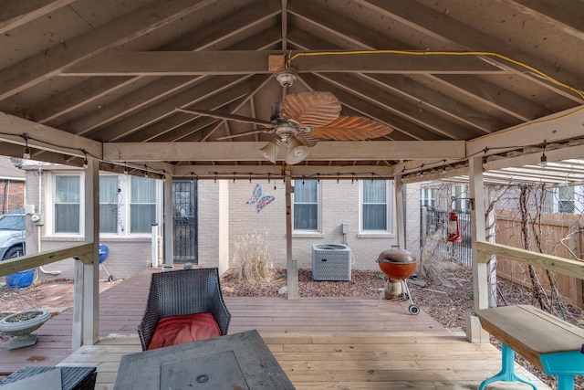 wooden terrace featuring a gazebo, cooling unit, and ceiling fan