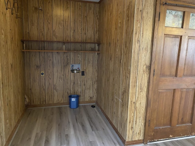 laundry room featuring hookup for an electric dryer, washer hookup, and light hardwood / wood-style flooring