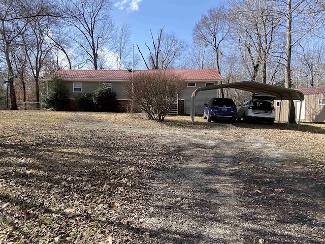 view of front of house featuring a carport