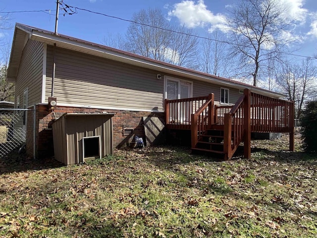 rear view of house with a deck