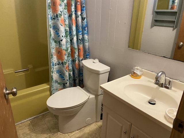 full bathroom featuring shower / tub combo with curtain, vanity, tile patterned floors, and toilet