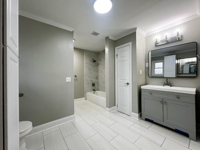 full bathroom with vanity, tiled shower / bath, ornamental molding, and toilet