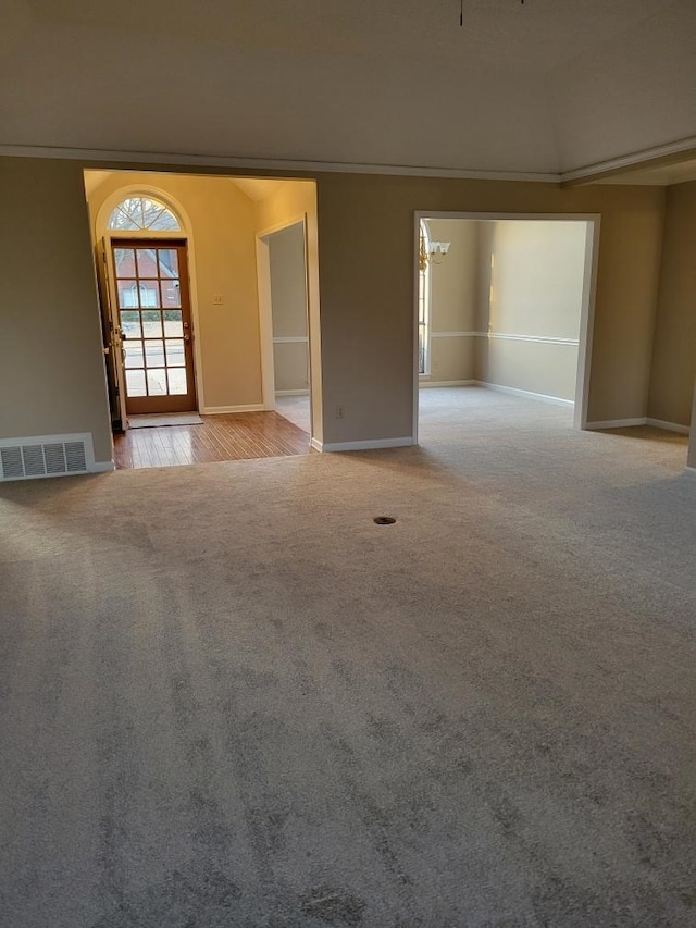 empty room featuring light colored carpet