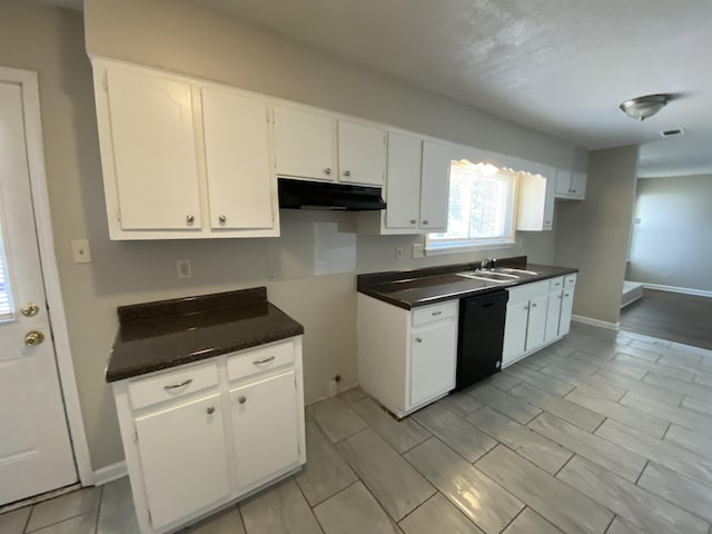 kitchen featuring sink, dishwasher, and white cabinets