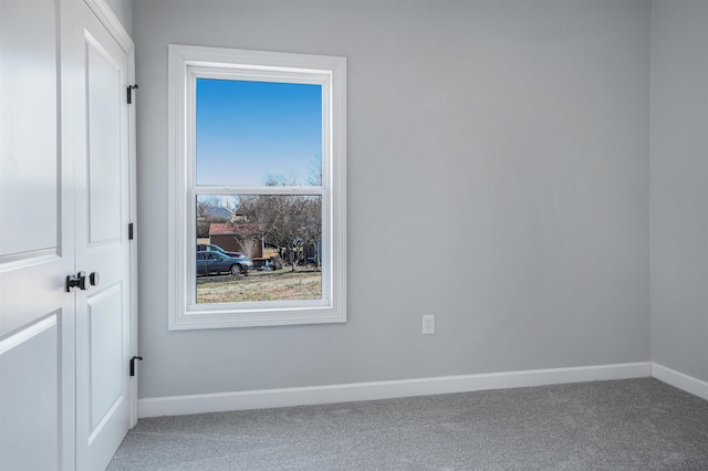 spare room with carpet flooring