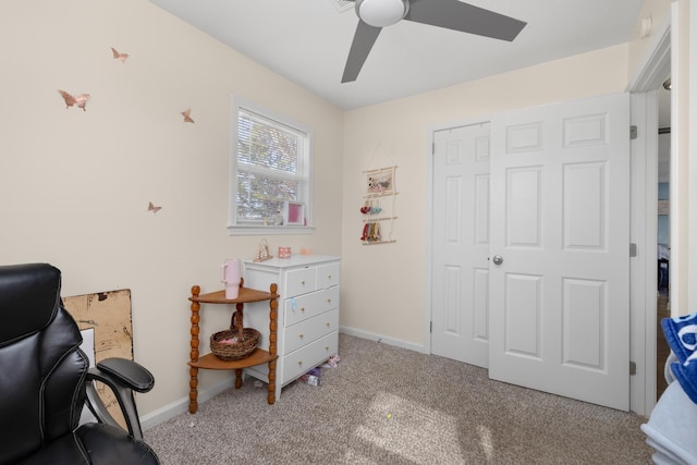 sitting room with light colored carpet and ceiling fan