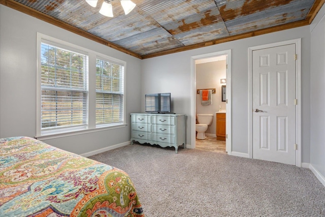 bedroom featuring crown molding, ceiling fan, connected bathroom, light carpet, and wooden ceiling