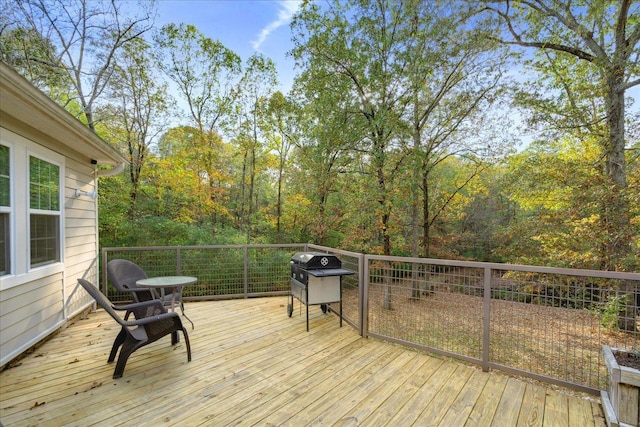 wooden deck featuring grilling area