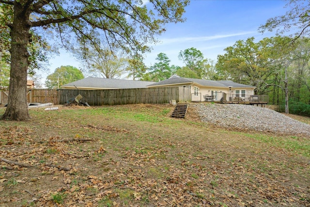 view of yard featuring a wooden deck