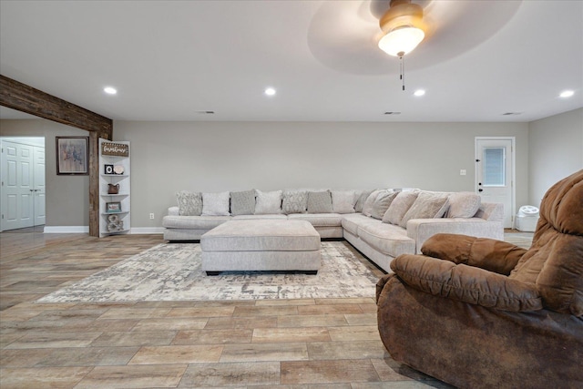 living room with ceiling fan