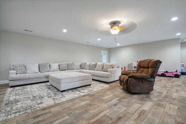 living room with light hardwood / wood-style flooring