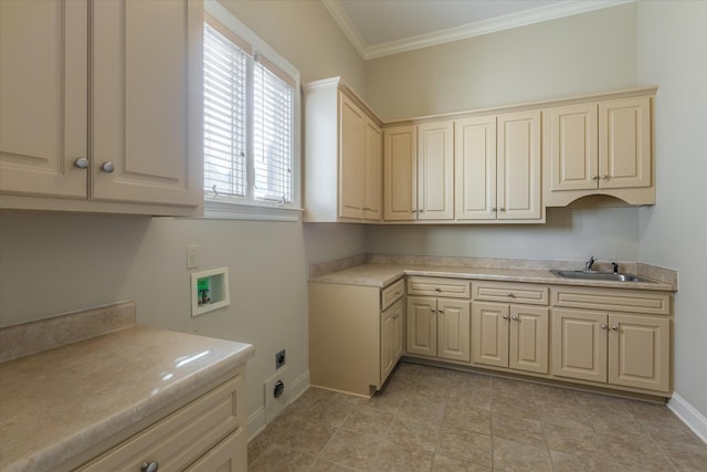 washroom with sink, cabinets, ornamental molding, hookup for a washing machine, and hookup for an electric dryer